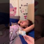 Toddler stops crying when she receives cash